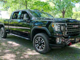 Black Pickup Truck with Ironman Tires