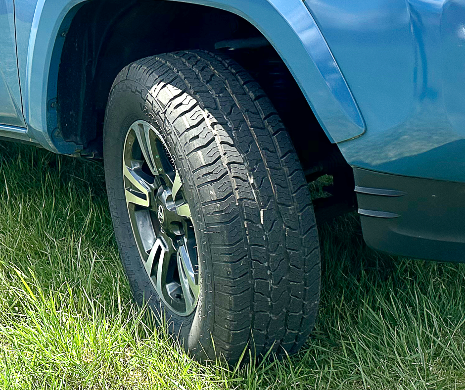 Ironman Tires on vehicle parked in grass